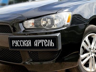 Накладка номерного знака Mitsubishi Lancer X (CY_A) 2007 - наст. время.